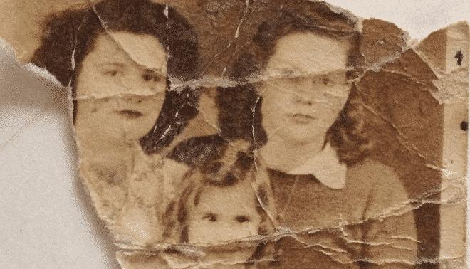 Original MH-E3 low-detail family portrait with folds and tears crossing faces.